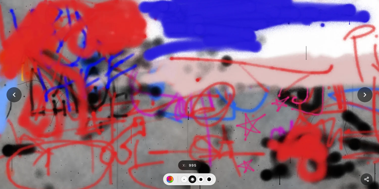 The spawn point of the TasteBueno Wall, layered spray paint from dozens of visitors